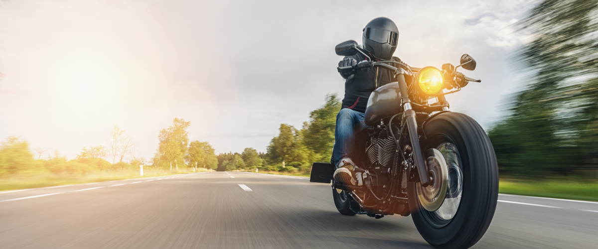 Motorcycle driver on the road.