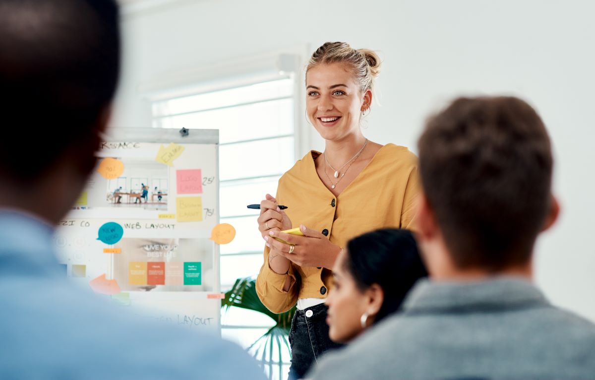 Woman talking to her employees